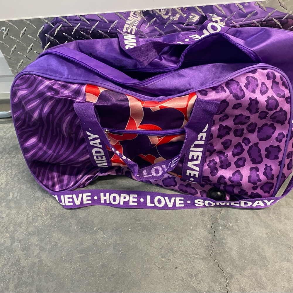 Justin Bieber Purple Travel Bags with Quilted Design